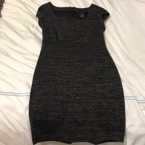Attention black and gold dress